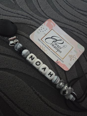 Attache tétine silicone raton laveur