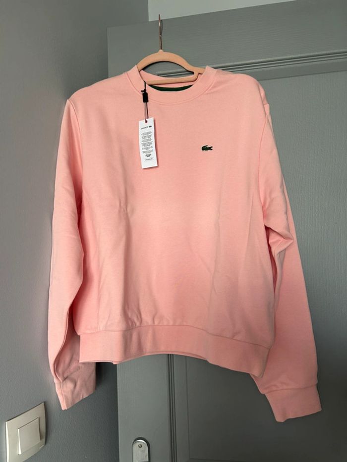 Sweat shirt Lacoste T. 42 neuf rose saumon