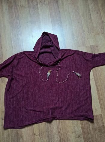 Pull poncho avec plumes