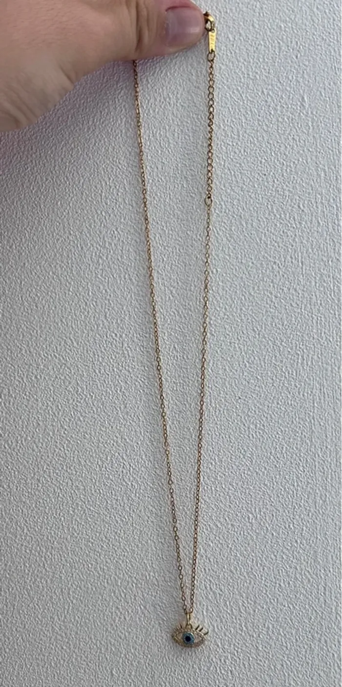 Collier œil protecteur en acier inoxydable plaqué or 18k et zircons - photo numéro 7
