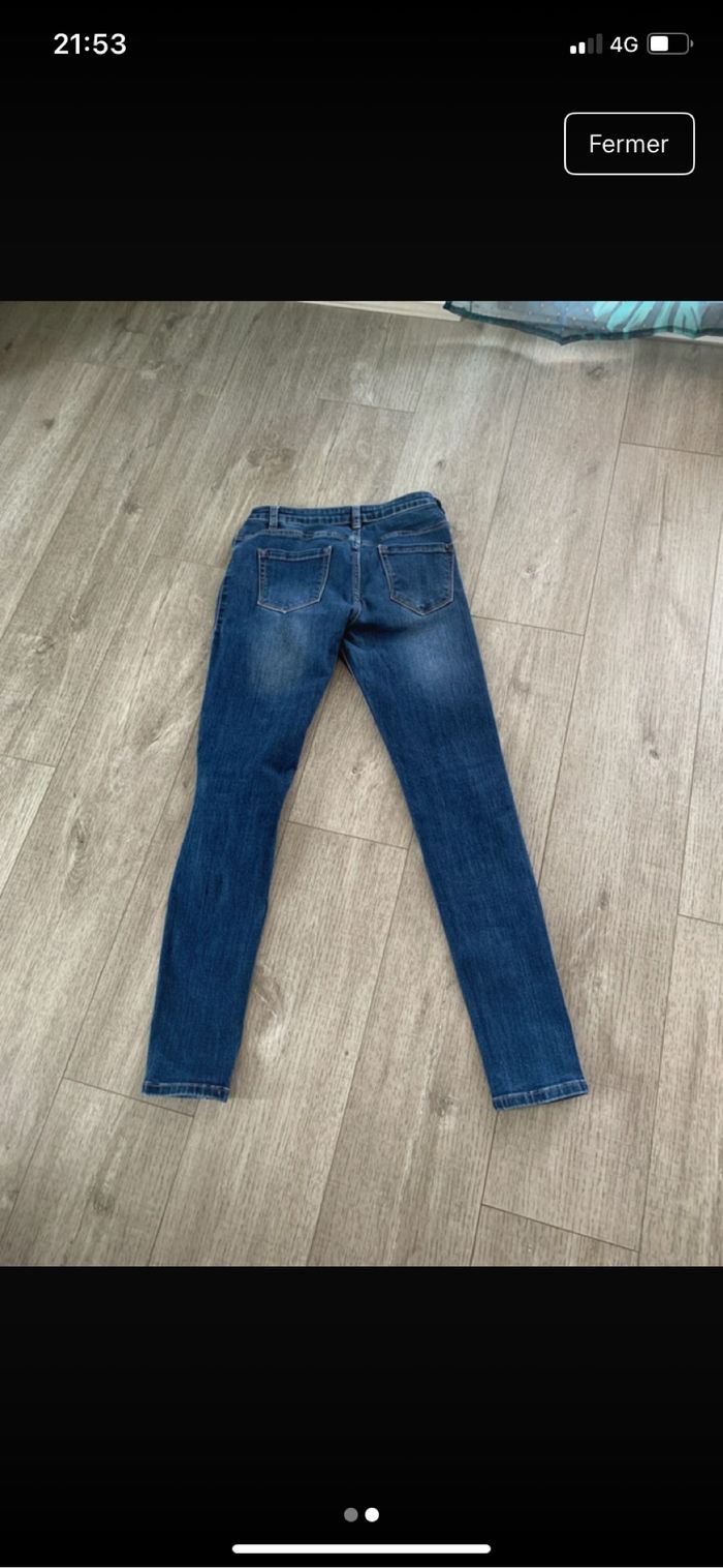 Jeans troué - photo numéro 2