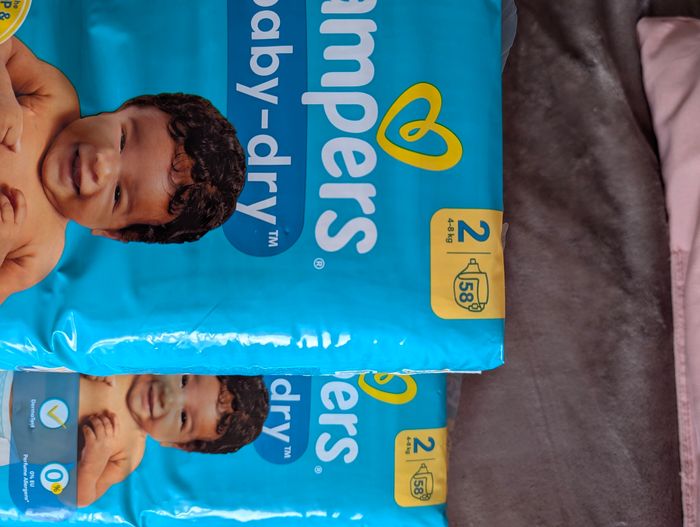 3 paquets de Couches Pampers taille 2 - photo numéro 2