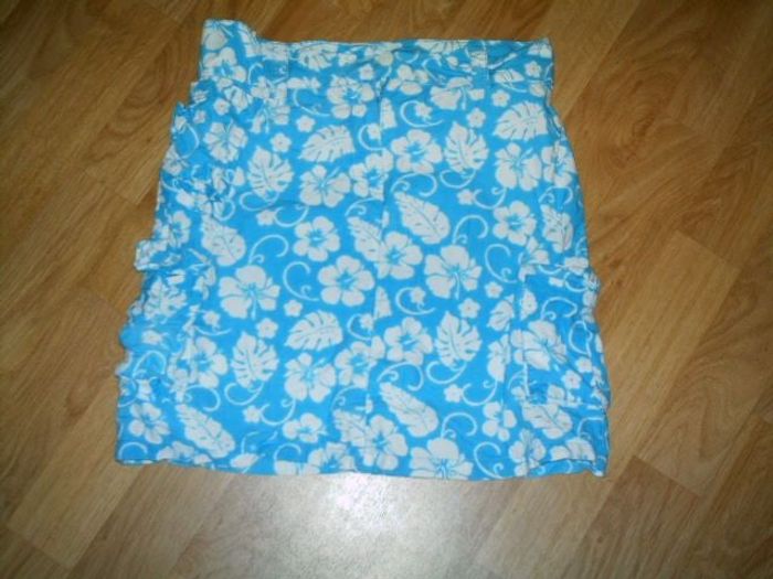 Jupe TEENS MOVING bleu turquoise et blanche taille 10 ans TBE