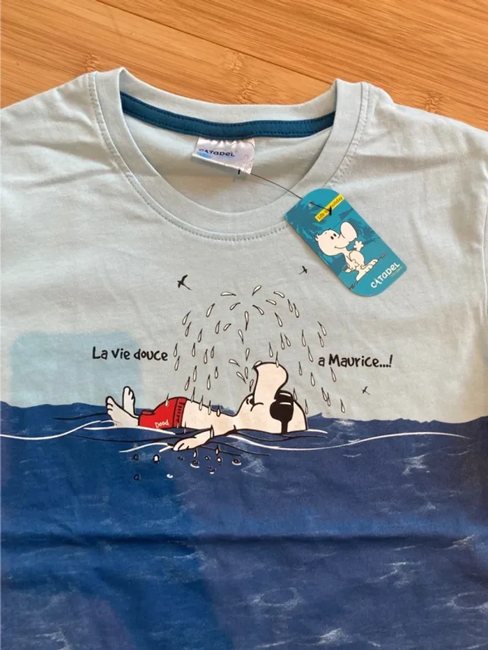 10 ans - T-shirt manches bleus  - neuf - inscription La vie douce à Maurice. - photo numéro 2