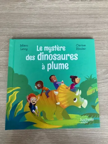 Livre hachette le mystère des dinosaures à plume