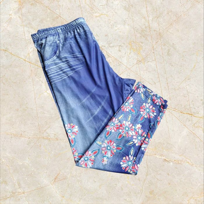Legging bleu en polyester/élasthane avec des fleurs taille 4XL neuf sans étiquette
