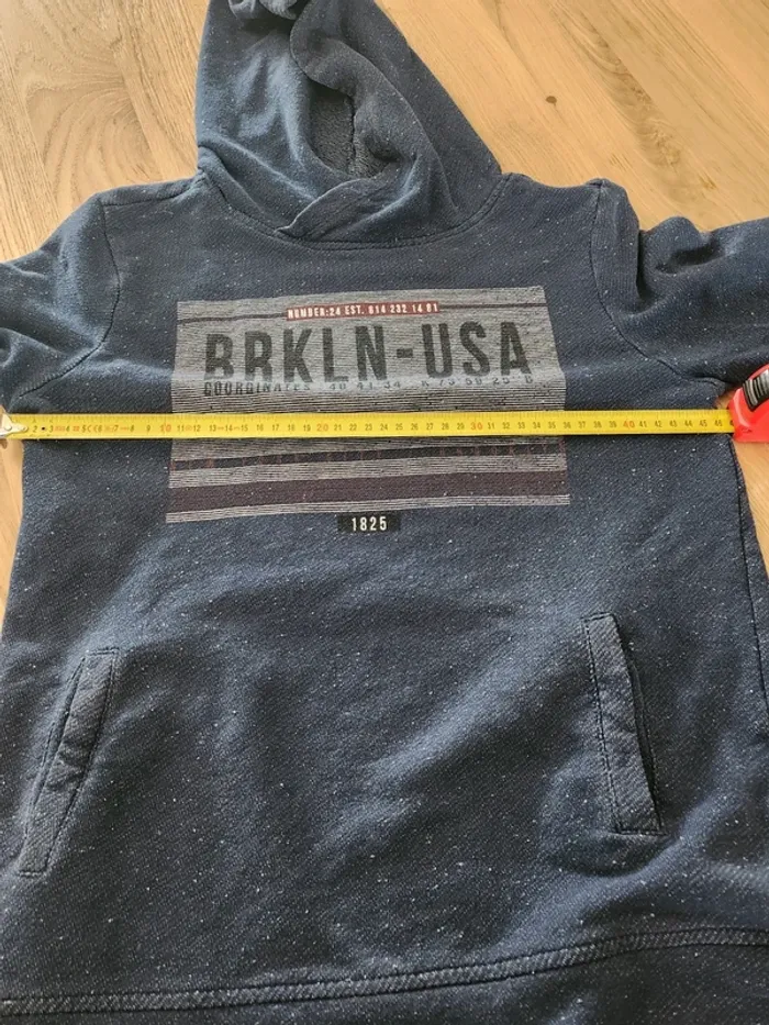 Pull à capuche et poches sur le devant kiabi 14 ans bon état Brkln USA - photo numéro 6