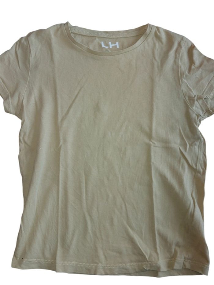 Tee-shirt jaune pâle taille 8ans