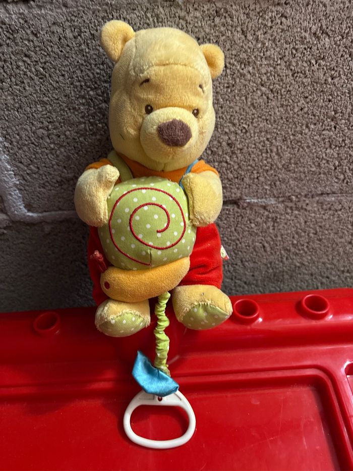 Doudou musical Winnie l’ourson