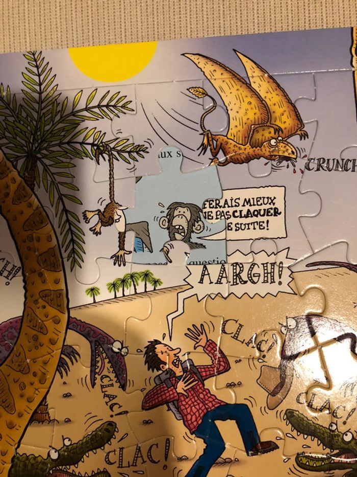 Livre avec plusieurs pages de puzzle dinosaures - photo numéro 4