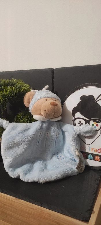 Doudou plat ours bleu bonnet coccinelle fleurs nicotoy marron noeud avion