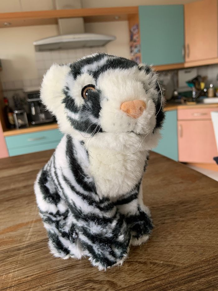 Peluche tigre blanc  parfait état