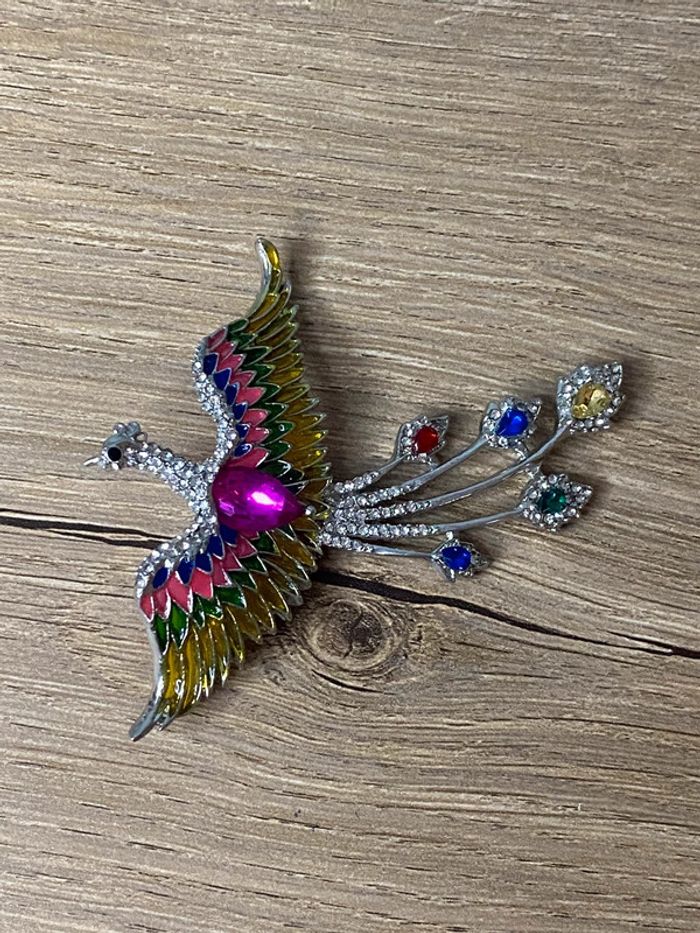 Broche phœnix tendance