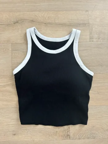 Top Uniqlo taille XS noir et blanc