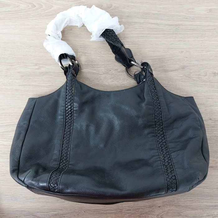 Sac porté épaule en cuir Caroll, lanière en daim un peu abimé