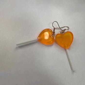 Boucle d'oreille sucette orange