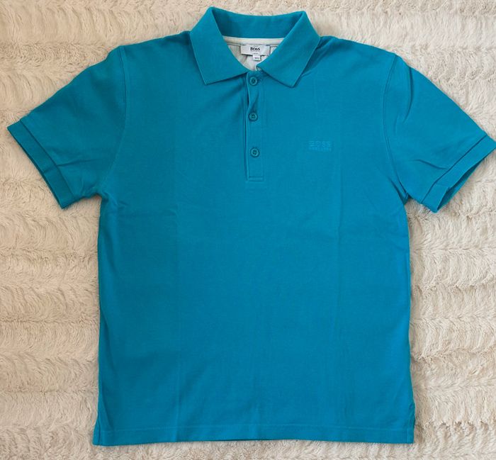 Polo Hugo boss taille 14 ans excellent état