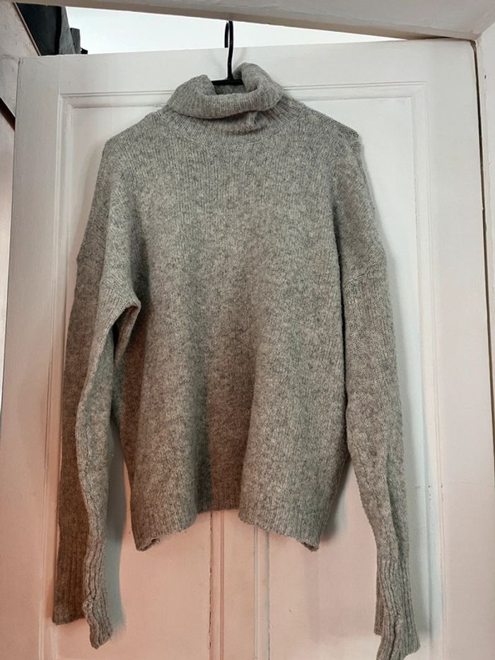 Pull col roulé