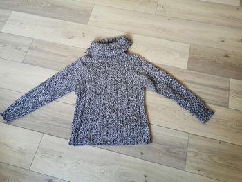 Pull col roule marron et blanc