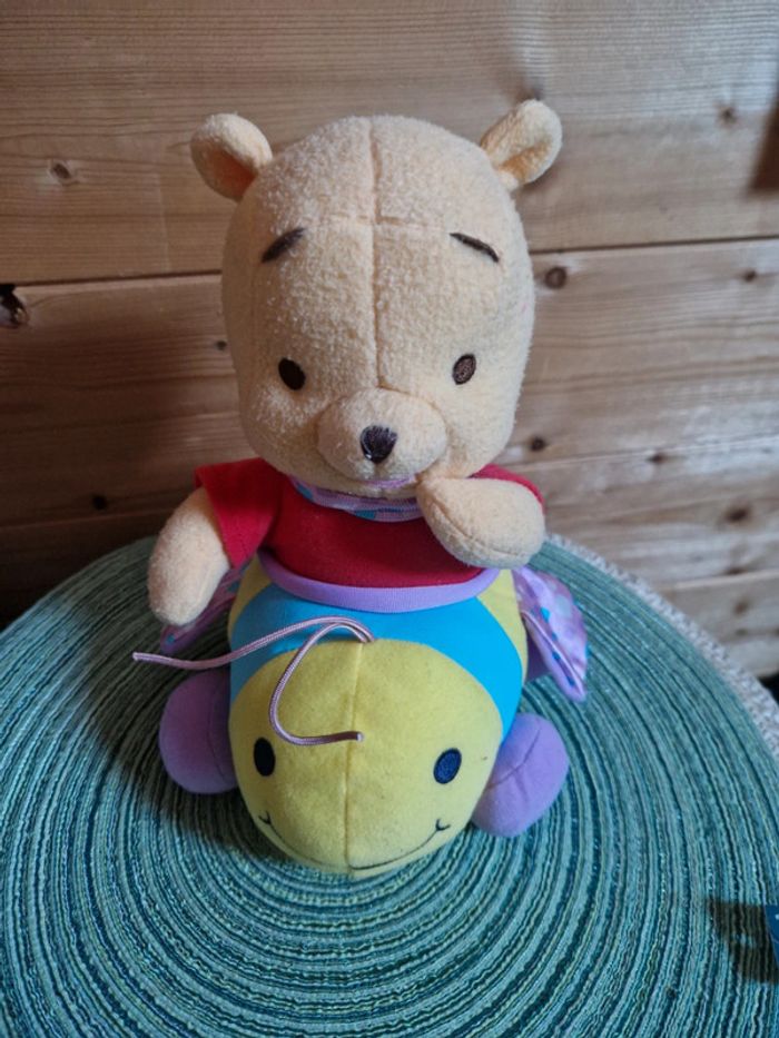 Winnie l'ourson sur son papillon - photo numéro 4