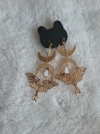 Boucles d oreilles acier pampille blanche