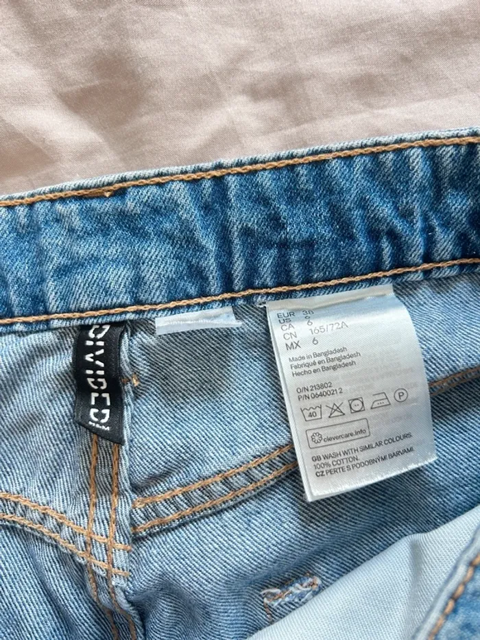 Jean troué bleu h&m taille 38 - photo numéro 3