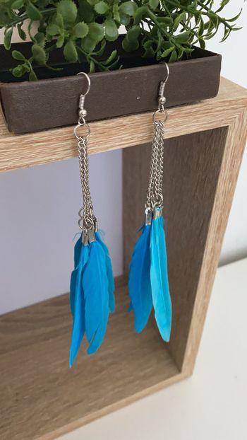 Boucles plume neuves