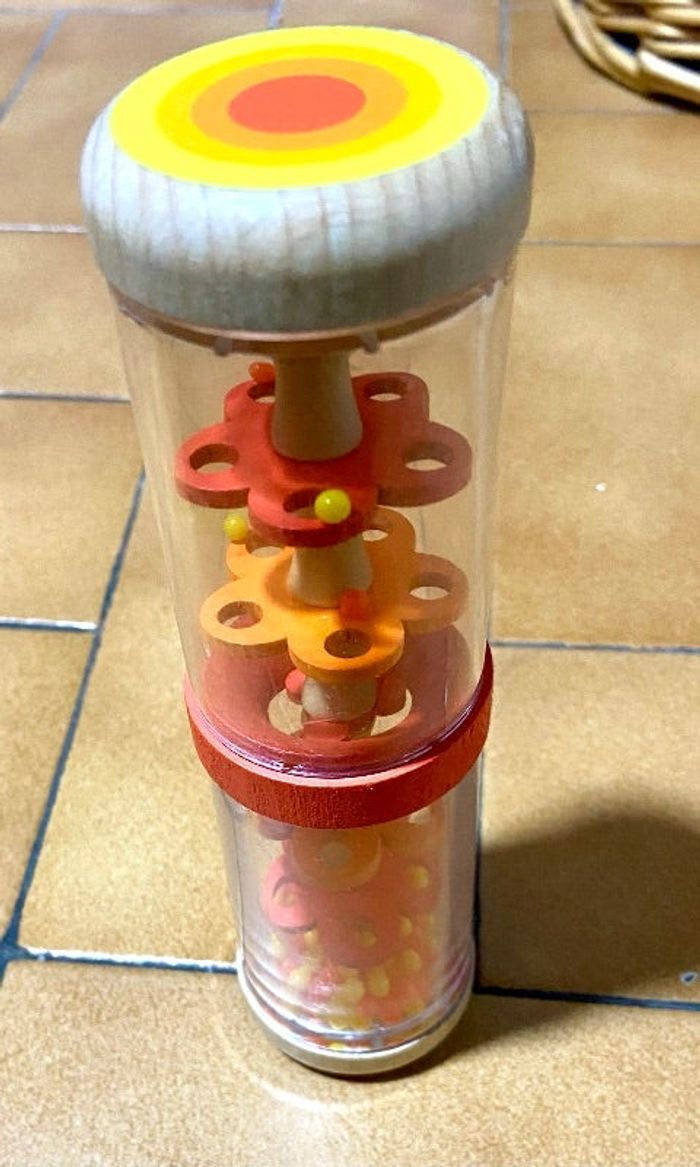 Bâton de pluie bébé effet vintage et bois orange rouge et bois