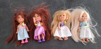 Lot de 4 petit poupée