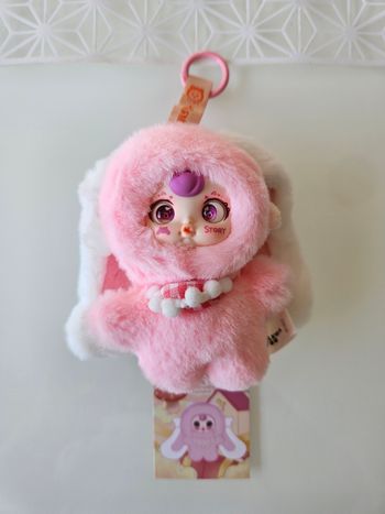 Magnifique peluche porte clés 