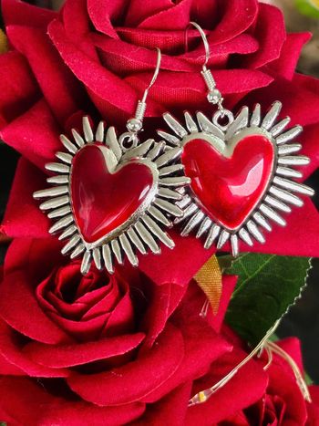 Boucles d oreilles coeur avec rayons en acier inoxydable