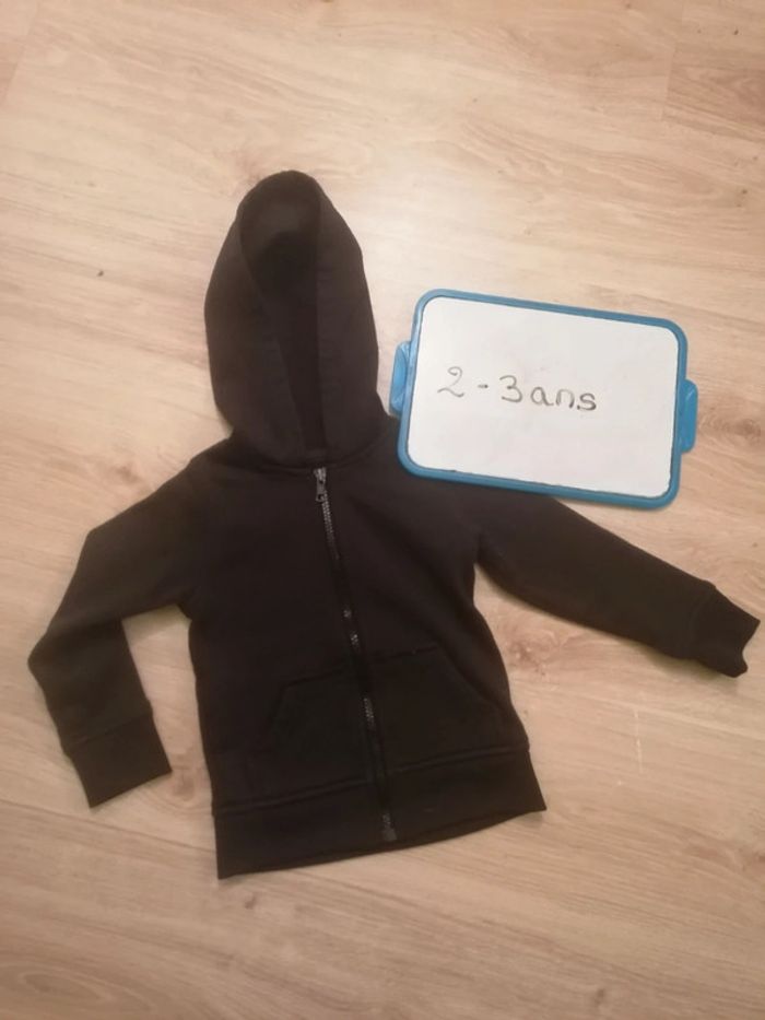 Veste noir.
