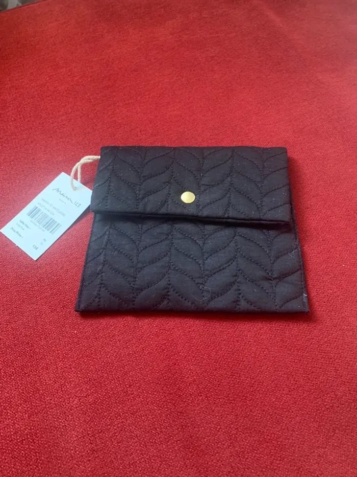 Pochette matelassée Maison 123