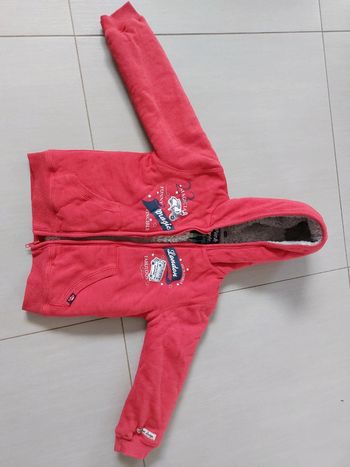 Manteau fourré rouge