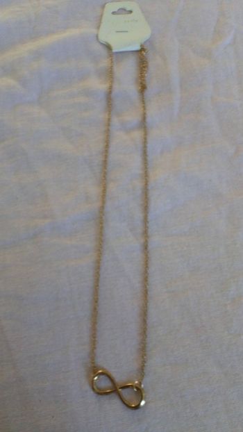 Collier doré grand infini