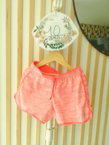 Short orange decathlon 10ans