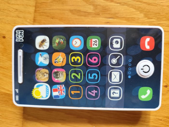 Téléphone et télécommande - photo numéro 2