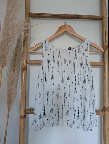 Débardeur avec ouverture dans le dos et flèches H&M