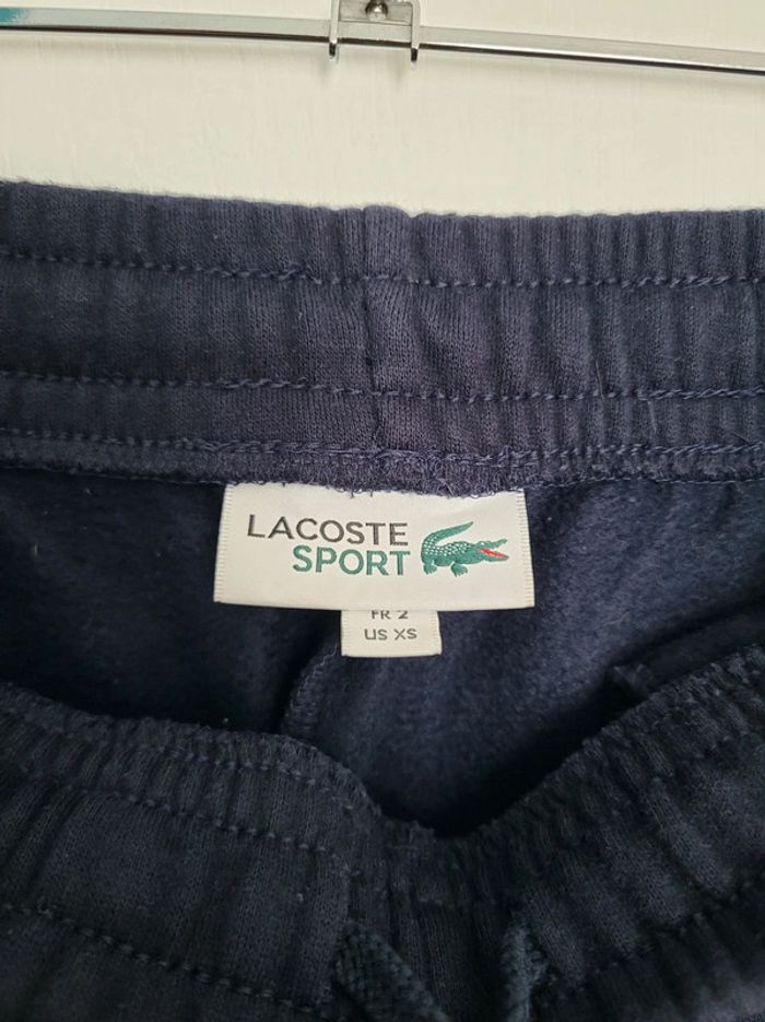 Ensemble jogging coton Lacoste comme neuf Mixte valeur 230€ - photo numéro 16