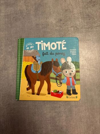 Livre timote fait du poney