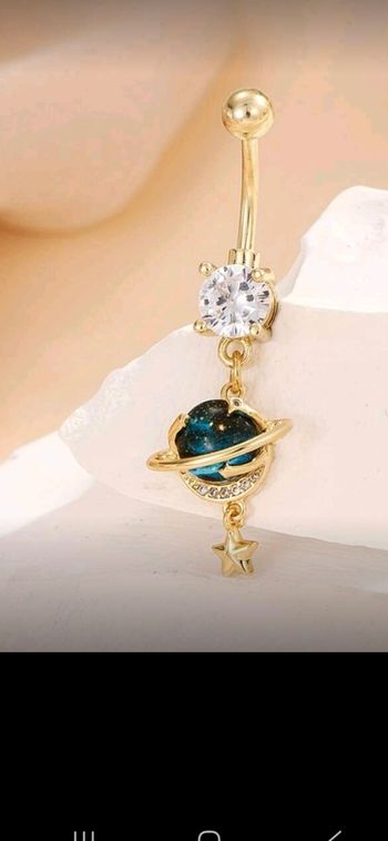 Piercing nombril gold planète 