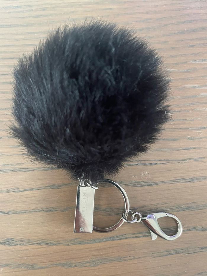 Porte clefs pompon noir fausse fourrure  maybelline état neuf