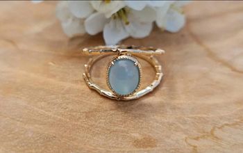 Bague ajourée plaqué or et agate bleue taille 50