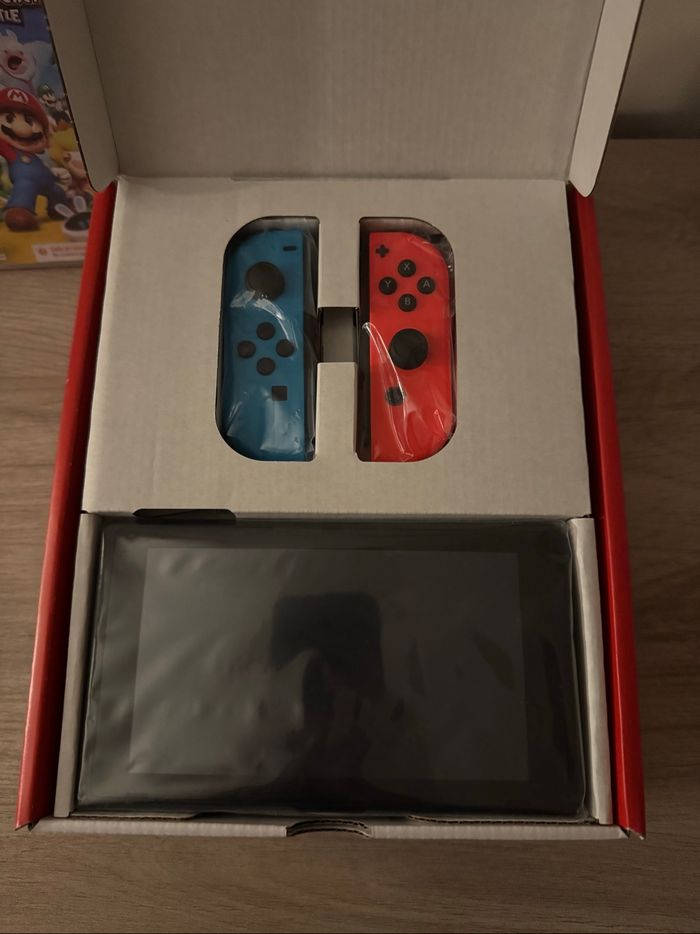 Nintendo switch 1 + 1 jeu + housse de transport - photo numéro 2