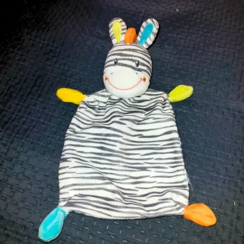 Doudou zèbre blanc, gris, orange, vert, jaune et bleu Nicotoy