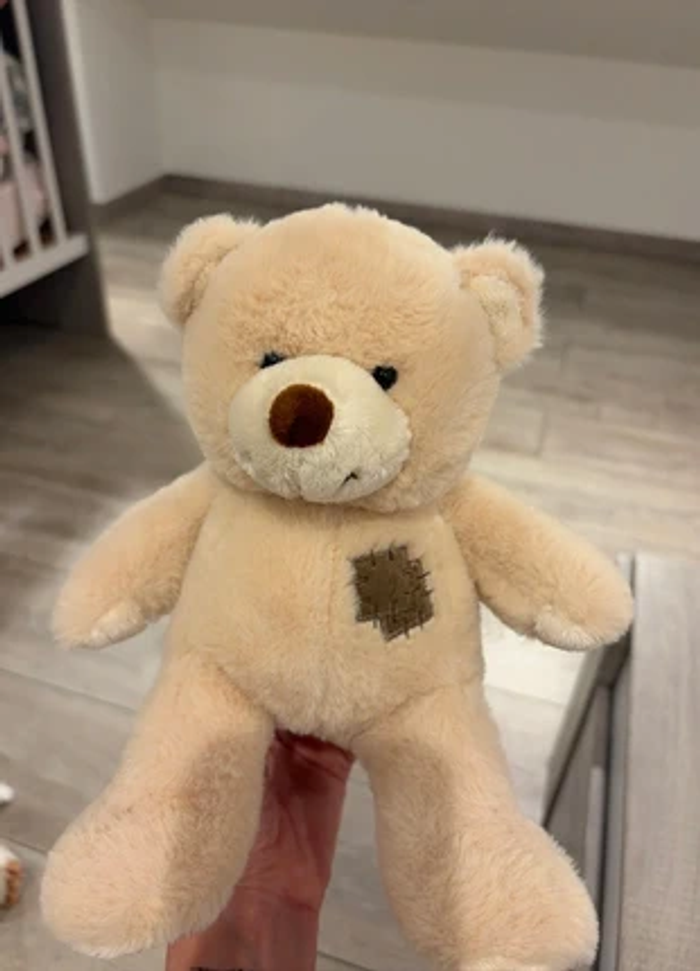 Nounours en peluche beige doux