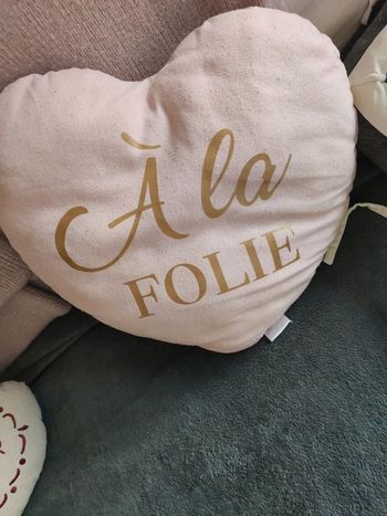 Coussin cœur rose pâle "à la folie "