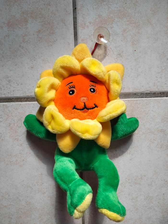 Peluche en fleur avec ventouses