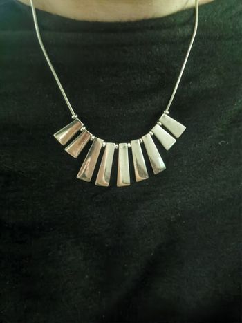 Collier argenté avec les pendents Bala Boosté