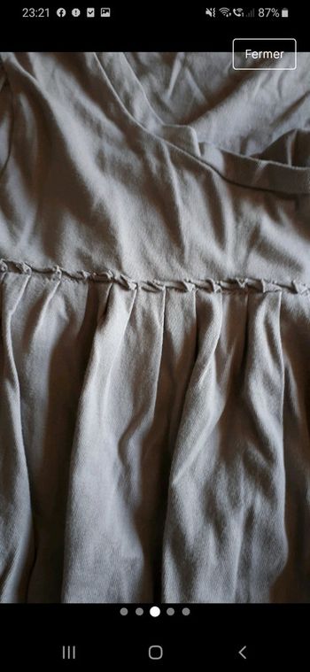 Joli top taille 3 va à un 42/44 avec noeud